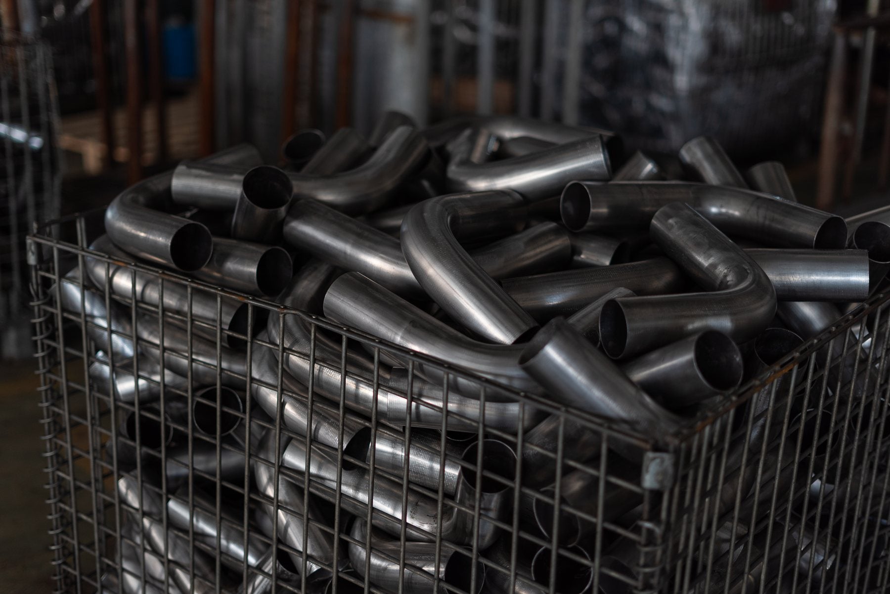 Batch bent pipe parts ready for DEF pipe replacement production