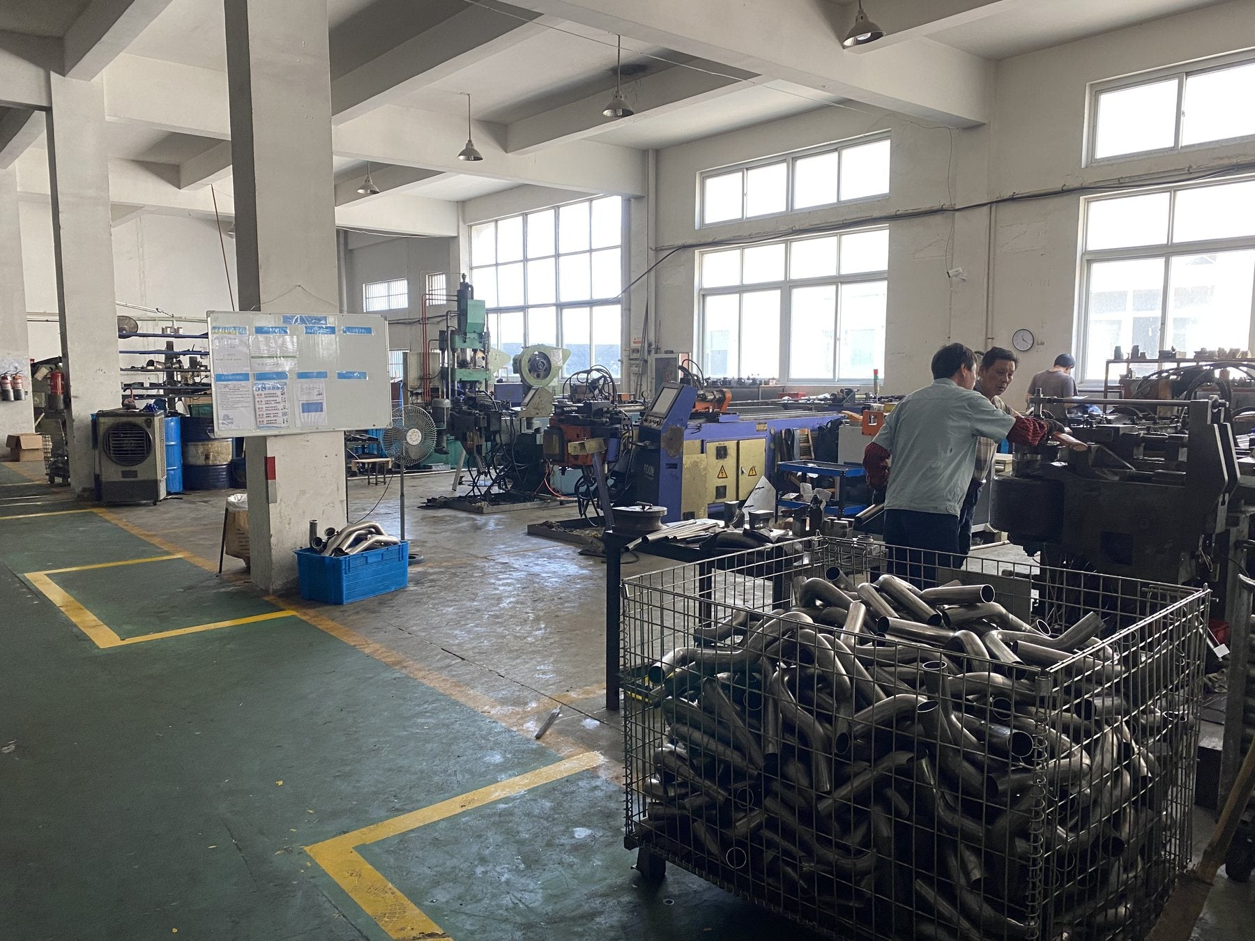 Workshop floor for truck DEF pipe parts production and inspection